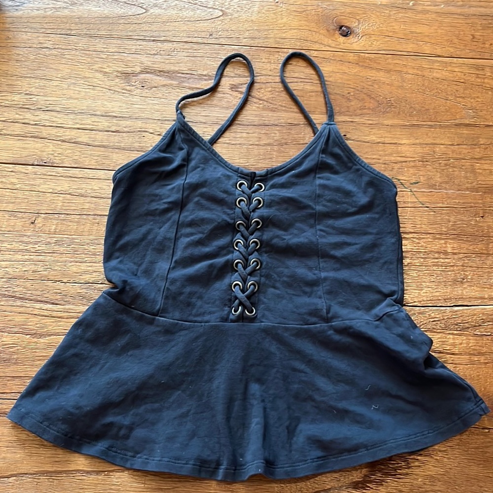 dark grey top with crisscross front